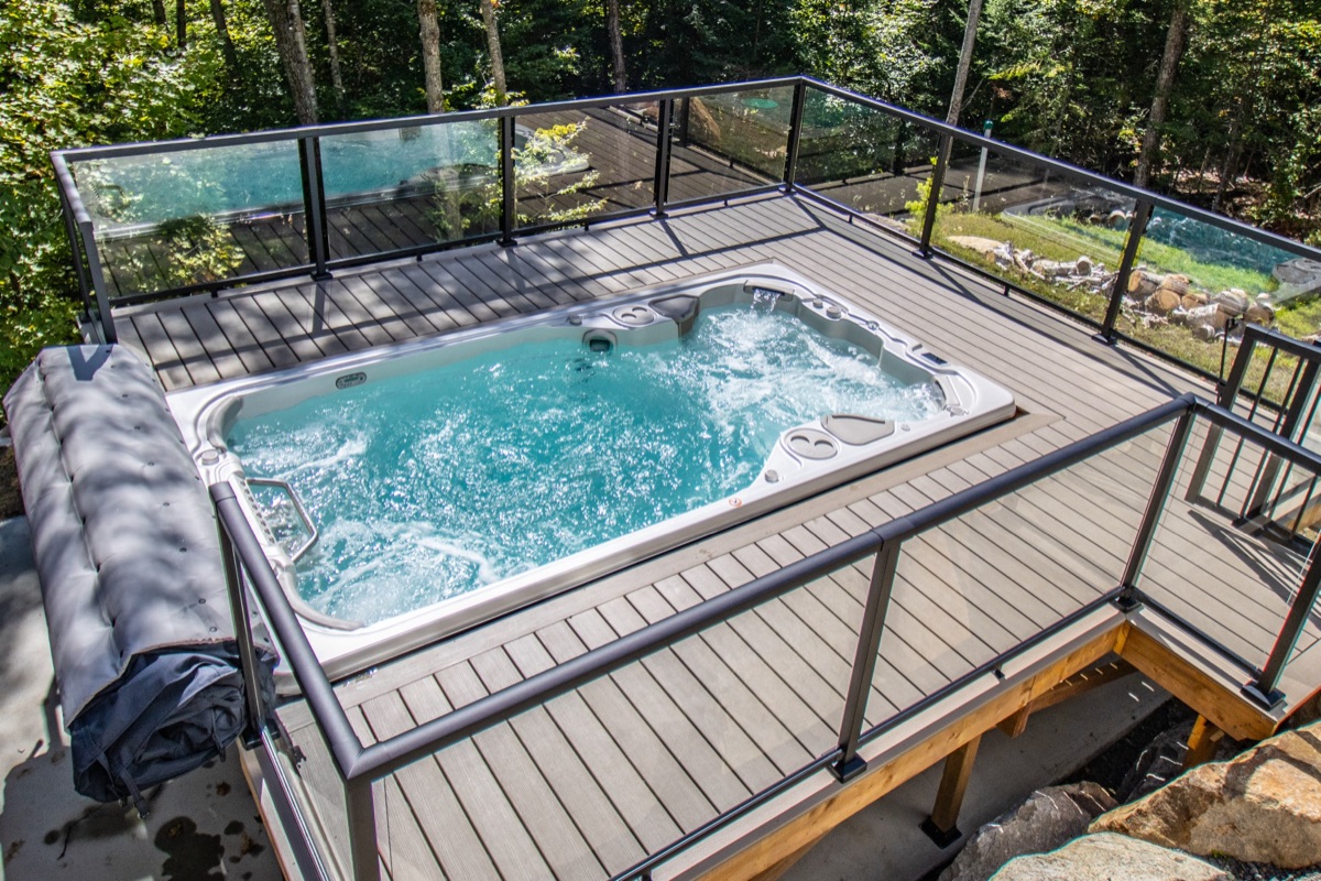 Hydropool Signature Collection hot tub on a backyard deck