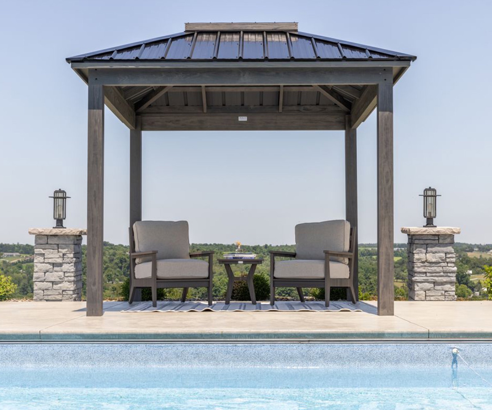 Seasonal World CabanaCoast cabana installed in a backyard setting