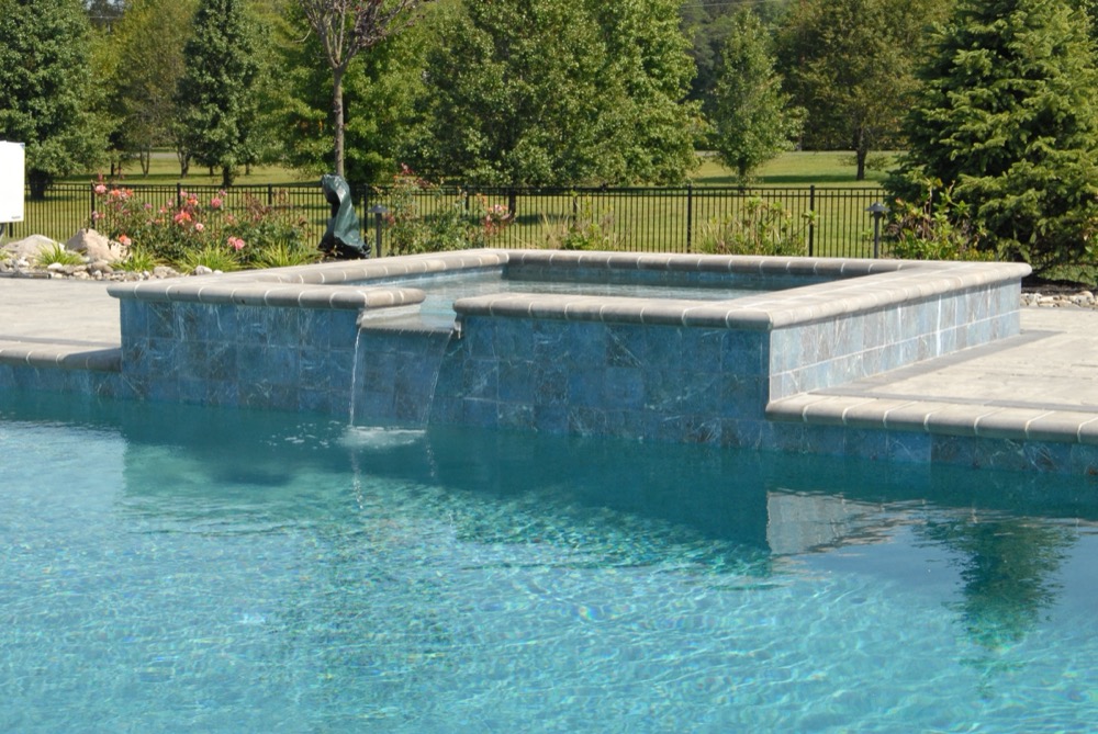Seasonal World service team opening a pool