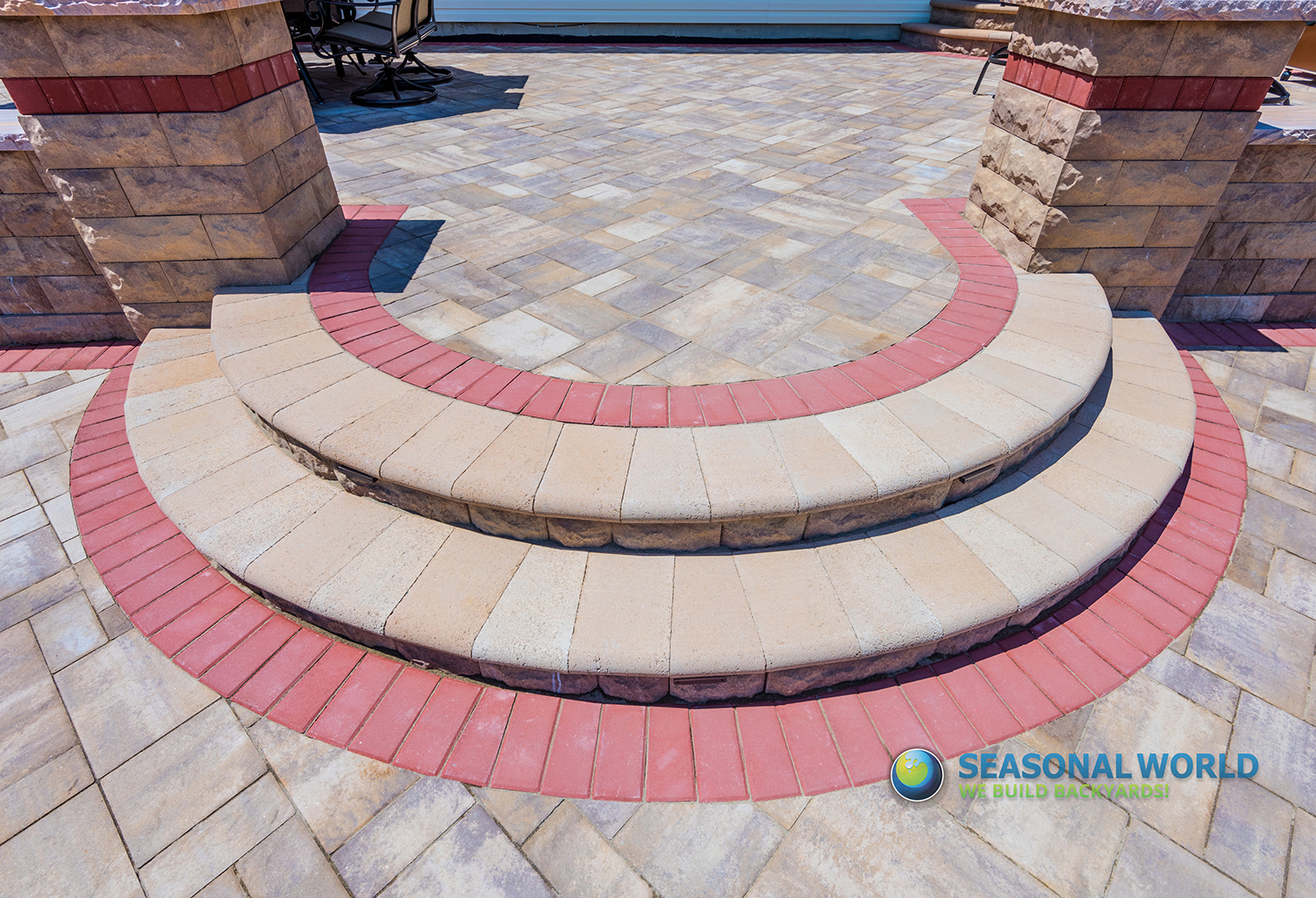 Seasonal World hardscape install — patio with steps and wall