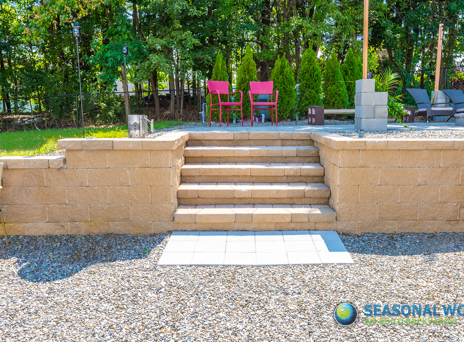 Seasonal World hardscape install — paver patio with seating area